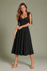 Robe à bretelles nouées dos nu