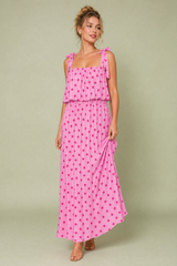 Robe longue rose à pois