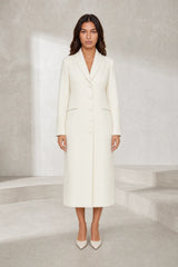 Manteau long cintré à col tailleur