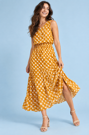 Robe longue jaune à pois avec col montant et détails drapés | Vue de face | Lounelle Paris