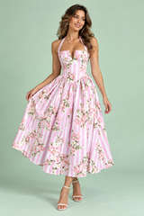 Robe longue rose dos nu à rayures et motifs floraux