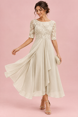 Robe en mousseline à corsage brodé ivoire