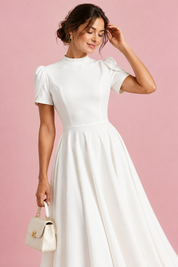 Robe midi blanche à col montant et manches bouffantes | Vue rapprochée | Lounelle Paris