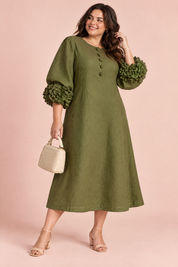 Robe midi vert olive coupe trapèze à manches bouffantes | Porté sur une silhouette plus ronde | Lounelle Paris