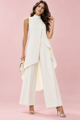 Ensemble pantalon blanc fluide avec top sans manches à col montant