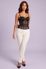 Top bustier noir à empiècements transparents