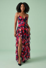 Robe longue noire asymétrique à manches cape et imprimé lys