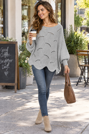 Pull gris oversize ajouré à col bateau | Photo lifestyle | Lounelle Paris