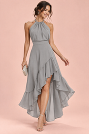 Robe grise à volants asymétriques et encolure dos nu | Vue de face | Lounelle Paris