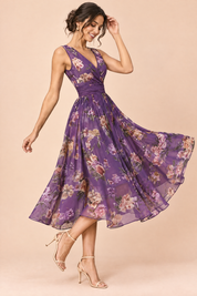 Robe midi violette à imprimé de bouquets floraux, col carré et coupe trapèze | Vue de dos | Lounelle Paris