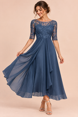 Robe en mousseline à corsage brodé bleu marine