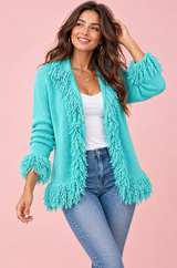 Gilet turquoise à franges