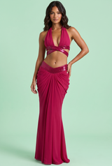 Ensemble magenta à dos nu avec jupe longue drapée