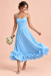 Robe midi bleu ciel évasée à bas volanté | Vue de face | Lounelle Paris