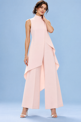Ensemble pantalon rose fluide avec top sans manches à col montant