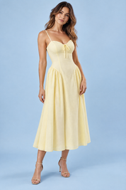 Robe midi jaune à imprimé floral, décolleté cœur et fronces | Vue de face | Lounelle Paris