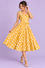 Robe midi trapèze jaune à pois et encolure cœur