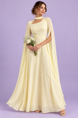 Robe longue jaune clair à encolure carrée et manches cape