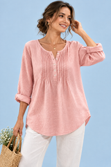 Blouse rose en coton à col rond et patte de boutonnage plissée