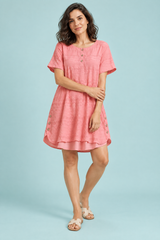Blouse rose oversize boutonnée devant