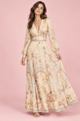Robe longue écrue à col V et manches bouffantes