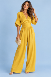 Combinaison pantalon jaune à col V et jambes larges | Vue de face | Lounelle Paris