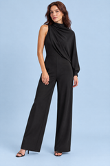 Combinaison-pantalon noire à col montant avec une seule manche longue