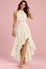 Robe crème à volants asymétriques et encolure dos nu