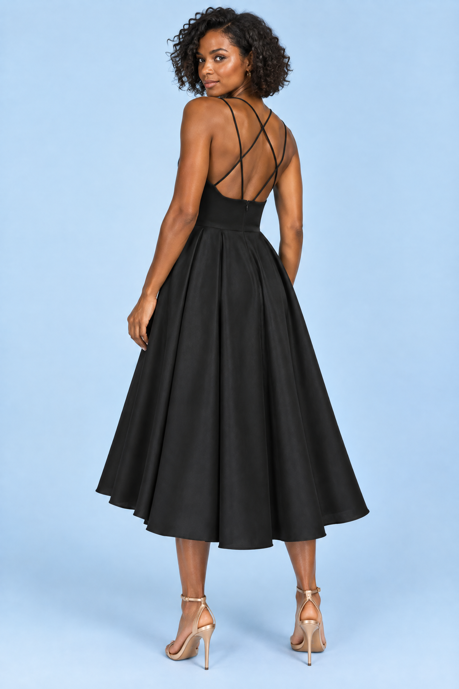 Robe midi noire à fines bretelles et jupe ample | Vue de dos | Lounelle Paris